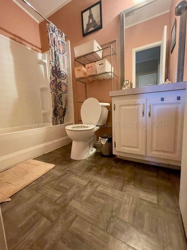 full bathroom featuring toilet, shower / tub combo, vanity, and ornamental molding