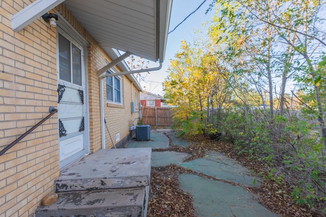 exterior space featuring central AC unit