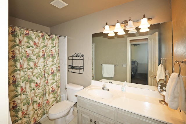 2604 Hawthorne Dr, Amarillo, TX 79109 - bathroom featuring vanity, toilet, and a shower with curtain