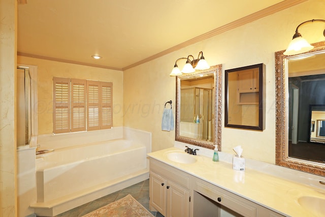 2604 Hawthorne Dr, Amarillo, TX 79109 - bathroom featuring a bath, double vanity, ornamental molding, a stall shower, and tile patterned floors