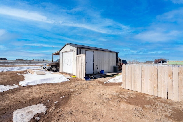 view of outbuilding with a garage