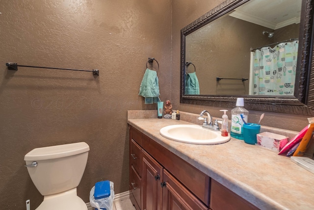 bathroom featuring toilet, a shower with curtain, vanity, and crown molding