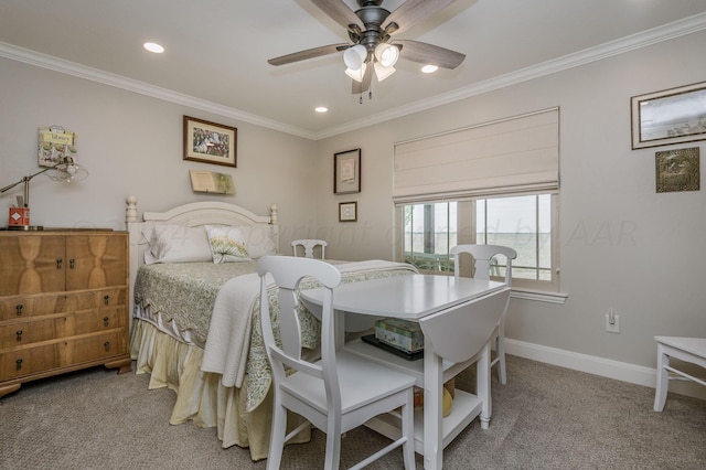 bedroom featuring ceiling fan, carpet floors, and ornamental molding