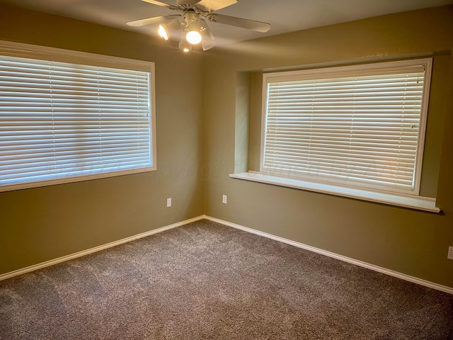 empty room with carpet floors and ceiling fan