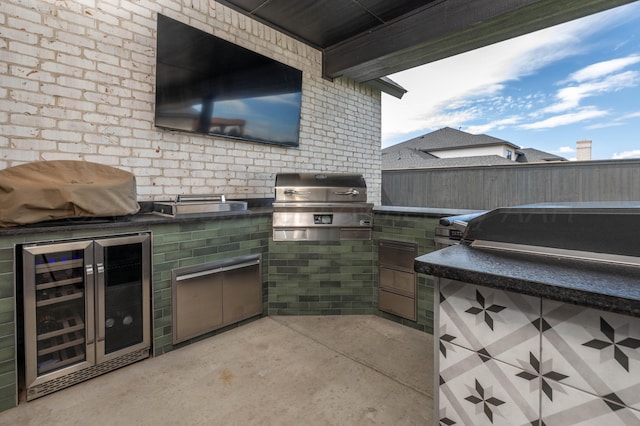 4410 N Rocking Chair Ln, Amarillo, TX 79124 - view of patio featuring wine cooler and an outdoor kitchen