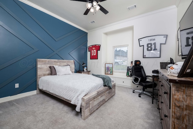 4410 N Rocking Chair Ln, Amarillo, TX 79124 - carpeted bedroom with a desk, ornamental molding, ceiling fan, and a decorative wall