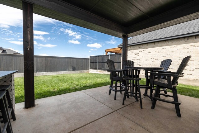 4410 N Rocking Chair Ln, Amarillo, TX 79124 - fenced backyard with a patio area