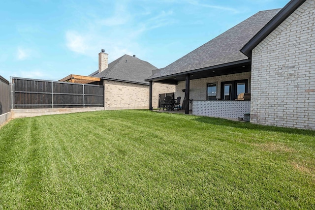 4410 N Rocking Chair Ln, Amarillo, TX 79124 - fenced backyard with a patio area