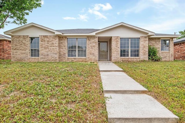 1132 Sterling Dr, Amarillo, TX 79110 - ranch-style house featuring a front lawn and brick siding