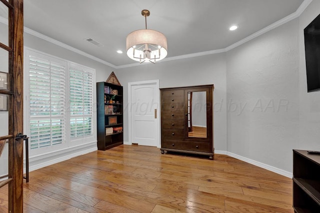 6007 Riley Elizabeth Dr, Amarillo, TX 79119 - unfurnished dining area featuring visible vents, crown molding, hardwood / wood-style floors, recessed lighting, and a notable chandelier