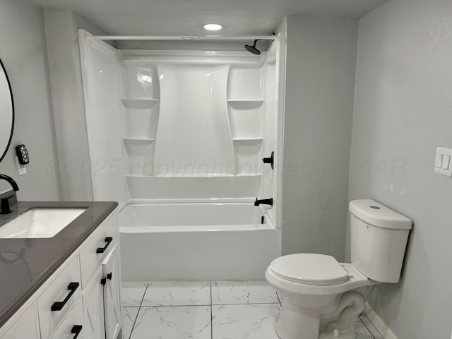 full bath featuring marble finish floor, shower / bath combination, toilet, vanity, and baseboards