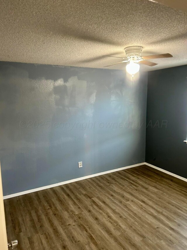 702 Floyd Ave, Dumas, TX 79029 - unfurnished room featuring wood finished floors, ceiling fan, a textured ceiling, and baseboards