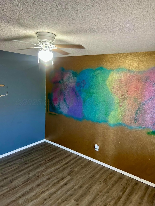 702 Floyd Ave, Dumas, TX 79029 - unfurnished room with wood finished floors, a textured ceiling, baseboards, and a ceiling fan