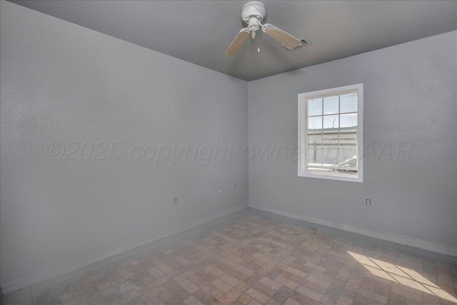 507 N Taylor St, Amarillo, TX 79107 - spare room with a ceiling fan and brick patterned floors