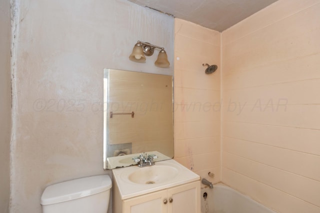 1600 S Hughes St, Amarillo, TX 79102 - bathroom with vanity, washtub / shower combination, and toilet