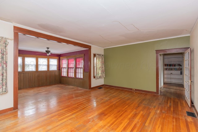 1600 S Hughes St, Amarillo, TX 79102 - empty room featuring light wood finished floors, ornamental molding, ceiling fan, and baseboards