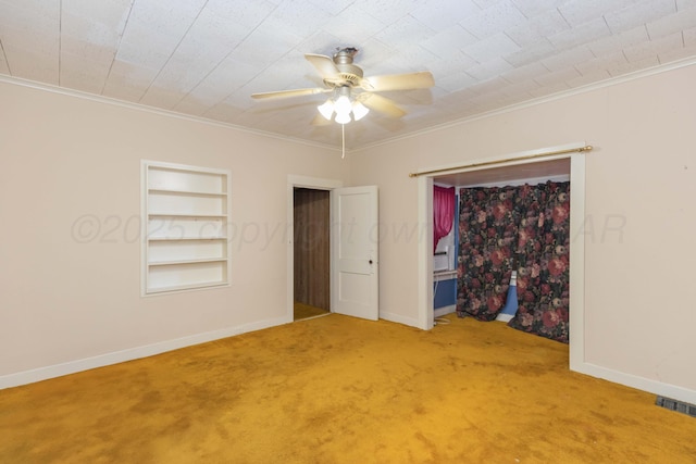 1600 S Hughes St, Amarillo, TX 79102 - carpeted spare room with built in features, crown molding, baseboards, and a ceiling fan