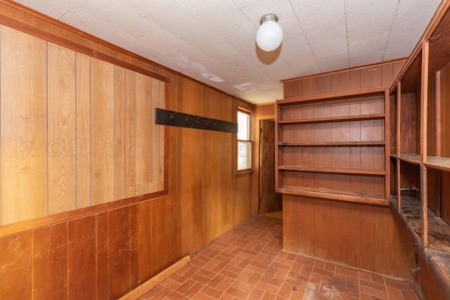 1600 S Hughes St, Amarillo, TX 79102 - interior space with wood walls and brick patterned flooring