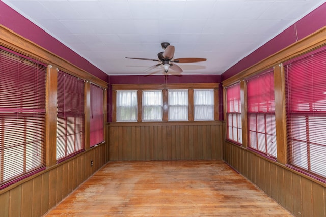 1600 S Hughes St, Amarillo, TX 79102 - unfurnished sunroom with wood finished floors and wood walls