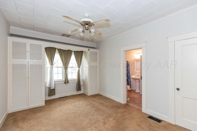 1600 S Hughes St, Amarillo, TX 79102 - unfurnished bedroom with ornamental molding, carpet, baseboards, and a ceiling fan