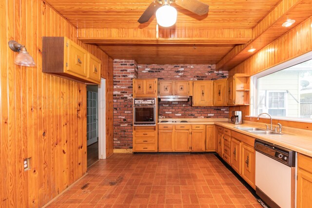 1600 S Hughes St, Amarillo, TX 79102 - kitchen with white appliances, a sink, wooden ceiling, brick patterned floors, and light countertops