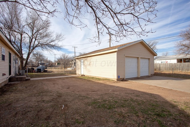 detached garage with fence