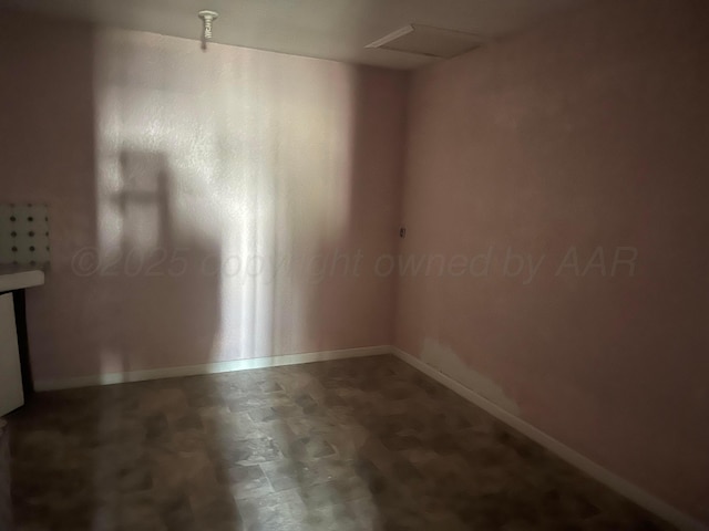 104 Peiffer St, Borger, TX 79007 - unfurnished room with attic access and baseboards