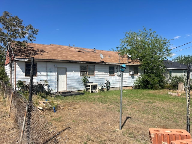 104 Peiffer St, Borger, TX 79007 - back of property with fence and a lawn