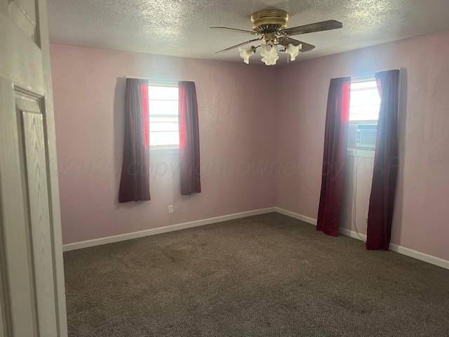 104 Peiffer St, Borger, TX 79007 - carpeted empty room with a ceiling fan, a wealth of natural light, baseboards, and a textured ceiling