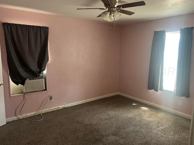 104 Peiffer St, Borger, TX 79007 - unfurnished room with a textured ceiling, baseboards, a ceiling fan, and carpet floors