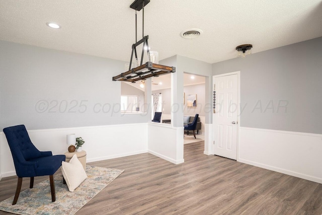 1301 Clyde St, Amarillo, TX 79106 - unfurnished room featuring a textured ceiling, wood finished floors, and recessed lighting