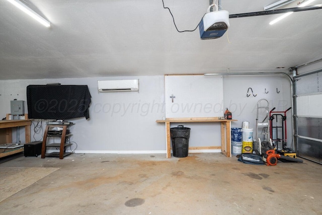 1301 Clyde St, Amarillo, TX 79106 - garage featuring a garage door opener, a wall mounted air conditioner, and a workshop area