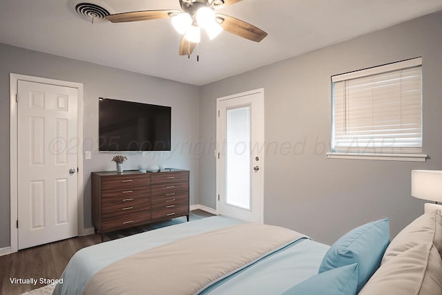 1301 Clyde St, Amarillo, TX 79106 - bedroom with dark wood finished floors and ceiling fan
