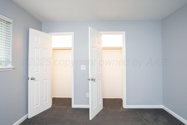 1301 Clyde St, Amarillo, TX 79106 - unfurnished bedroom featuring dark colored carpet