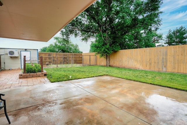 1301 Clyde St, Amarillo, TX 79106 - fenced backyard with a patio area and an AC wall unit