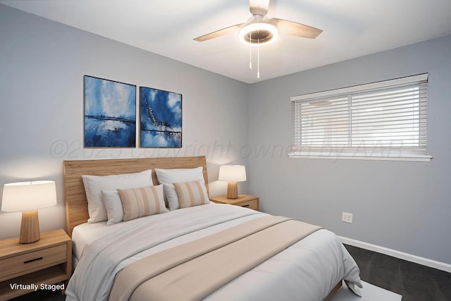 1301 Clyde St, Amarillo, TX 79106 - bedroom with baseboards and ceiling fan