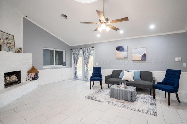 1301 Clyde St, Amarillo, TX 79106 - living area featuring a ceiling fan, vaulted ceiling, a fireplace, crown molding, and recessed lighting