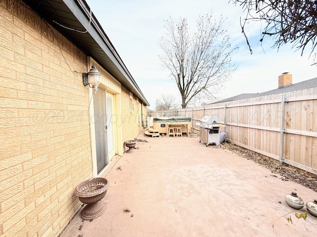 view of patio with area for grilling