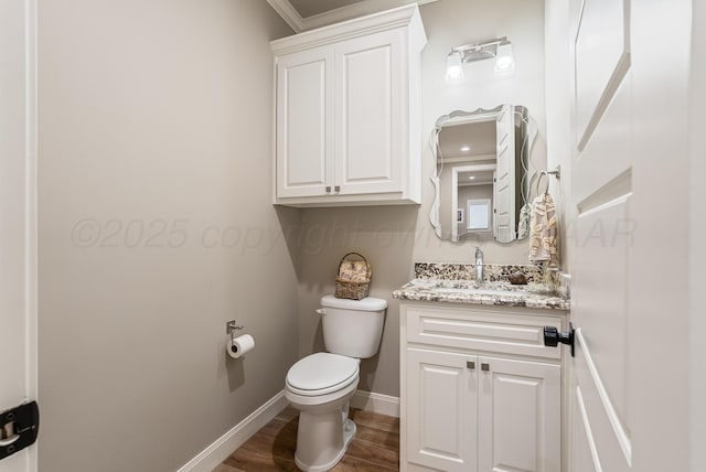 5504 Wesley Dr, Amarillo, TX 79119 - bathroom with vanity, crown molding, and wood finished floors