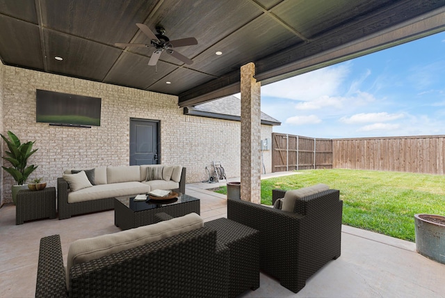 5504 Wesley Dr, Amarillo, TX 79119 - fenced backyard featuring a ceiling fan, outdoor lounge area, and a patio area