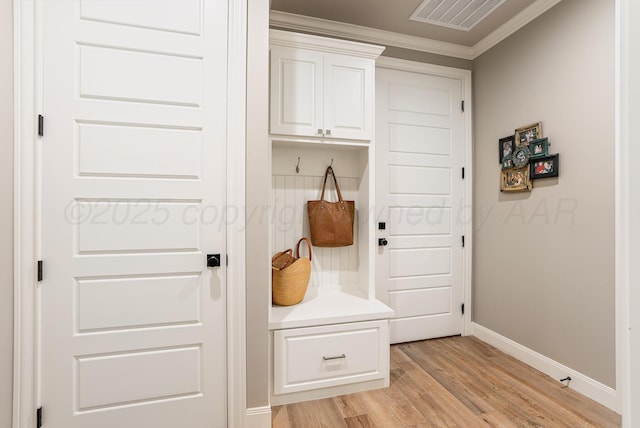 5504 Wesley Dr, Amarillo, TX 79119 - mudroom featuring light wood finished floors and crown molding