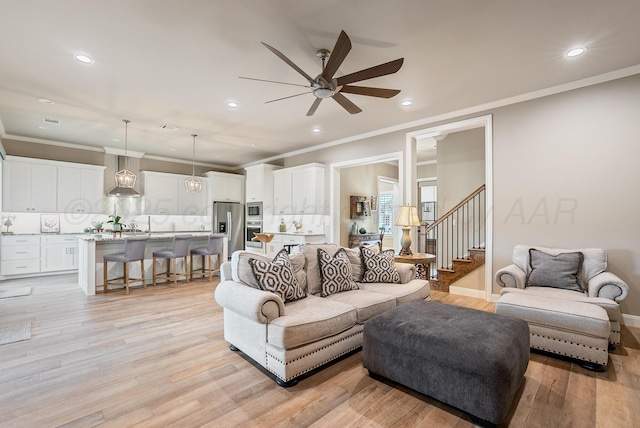 5504 Wesley Dr, Amarillo, TX 79119 - living area featuring a ceiling fan, recessed lighting, light wood-type flooring, stairway, and ornamental molding