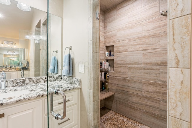5504 Wesley Dr, Amarillo, TX 79119 - bathroom with vanity and a tile shower