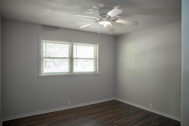 301 Maple Ave, Panhandle, TX 79068 - empty room with dark wood finished floors, ceiling fan, and a textured ceiling