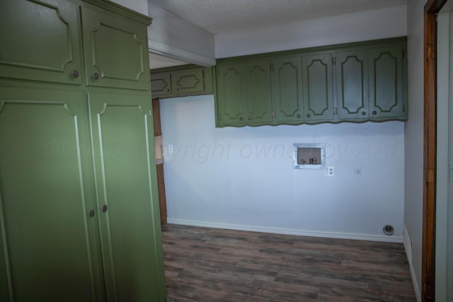 301 Maple Ave, Panhandle, TX 79068 - laundry area with washer hookup, dark wood-type flooring, cabinet space, and a textured ceiling