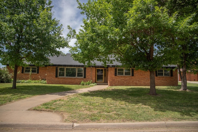 301 Maple Ave, Panhandle, TX 79068 - ranch-style home with a front lawn and brick siding