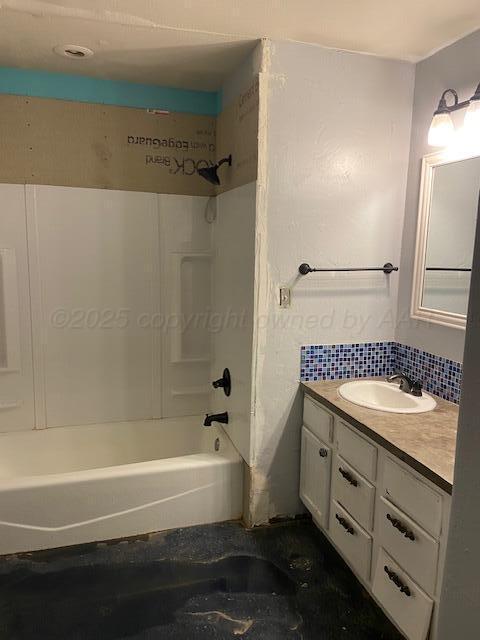 235 Cliffside Dr, Amarillo, TX 79118 - bathroom with vanity, shower / bath combination, and decorative backsplash