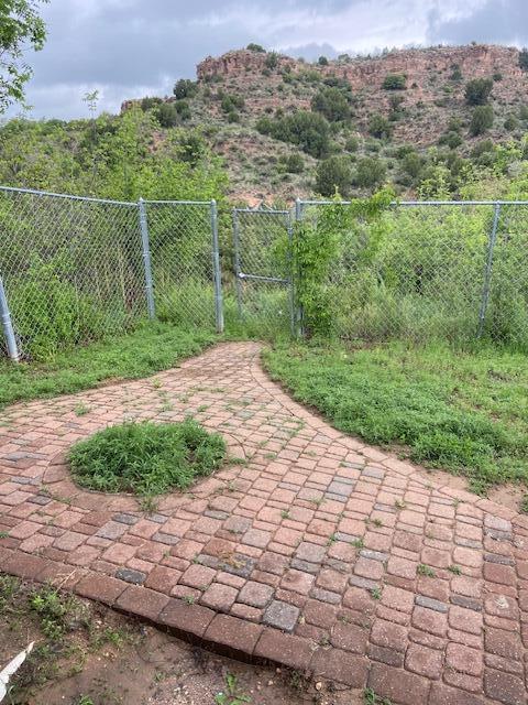 235 Cliffside Dr, Amarillo, TX 79118 - view of patio / terrace featuring fence and a gate