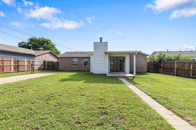 3302 Sequoia St, Amarillo, TX 79107 - rear view of house featuring a fenced backyard, a chimney, and a patio