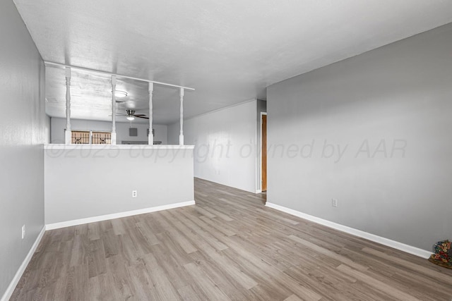 3302 Sequoia St, Amarillo, TX 79107 - unfurnished living room featuring wood finished floors and ceiling fan
